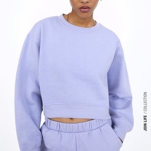 purple zara sweatshirt. NEVER WORN but tags off